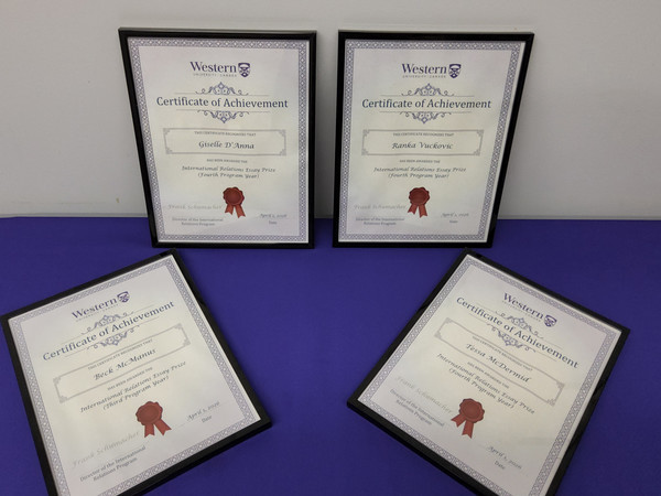 Image of essay prize winners' certificates